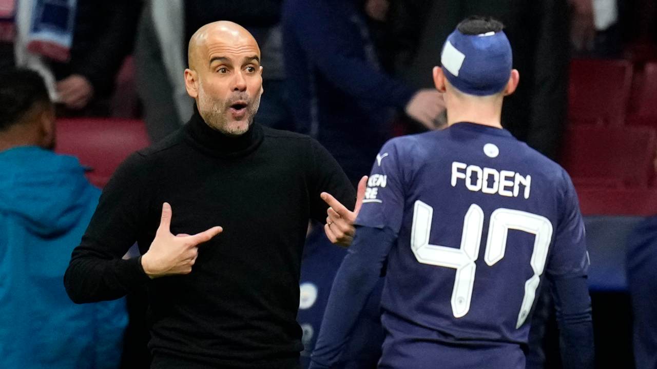 Pep Guardiola e Phil Foden